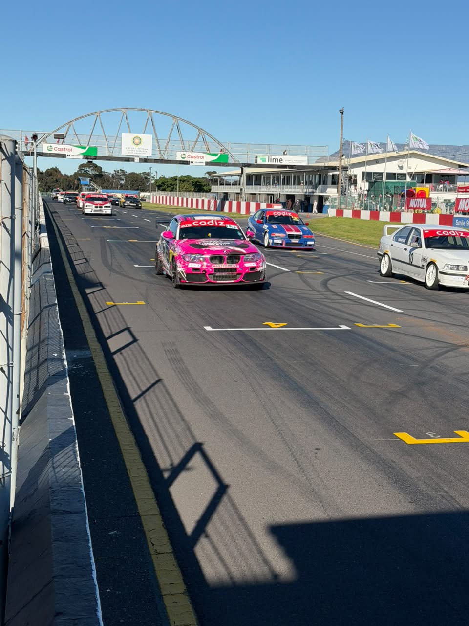 Pink BMW saloon, with Nicolaas Du Toit’s number 10 BMW E36 alongside